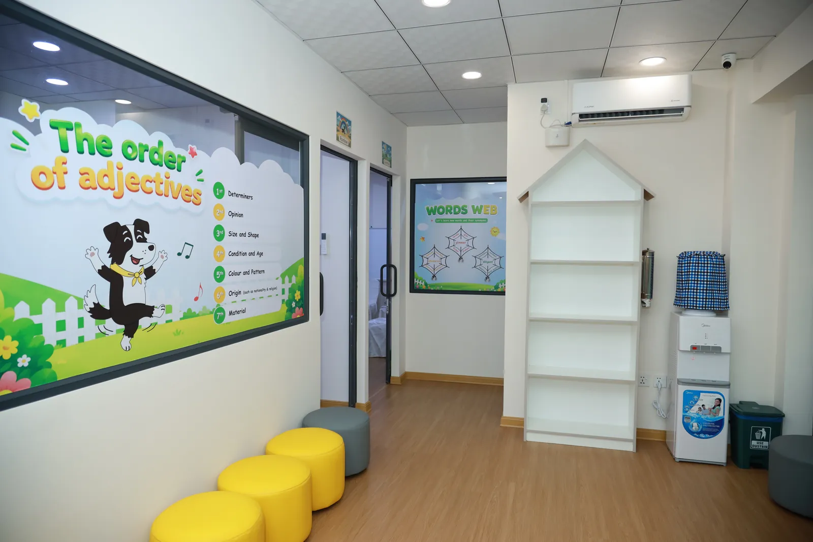 A bright Happee classroom with reading displays